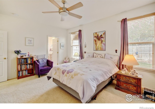4312 Windmill Dr, Brighton, CO 80601 - carpeted bedroom with ensuite bath and ceiling fan