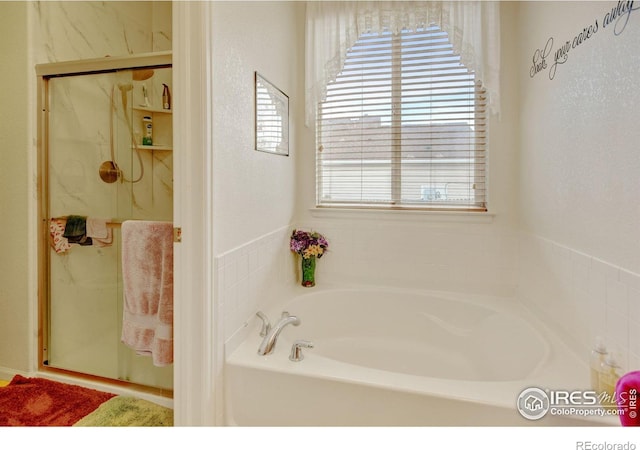 4312 Windmill Dr, Brighton, CO 80601 - full bath with a bath and a marble finish shower