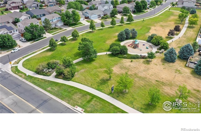 4312 Windmill Dr, Brighton, CO 80601 - aerial perspective of suburban area featuring a park