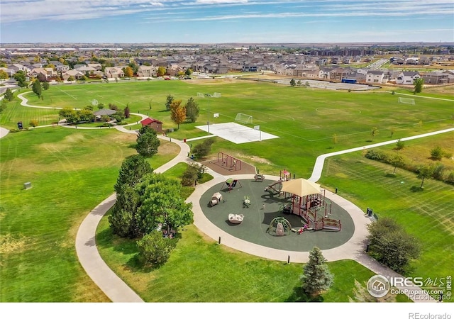 4312 Windmill Dr, Brighton, CO 80601 - aerial perspective of suburban area with a recreational park