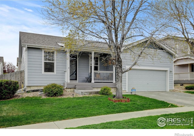 4312 Windmill Dr, Brighton, CO 80601 - view of front facade with covered porch, a garage, and concrete driveway