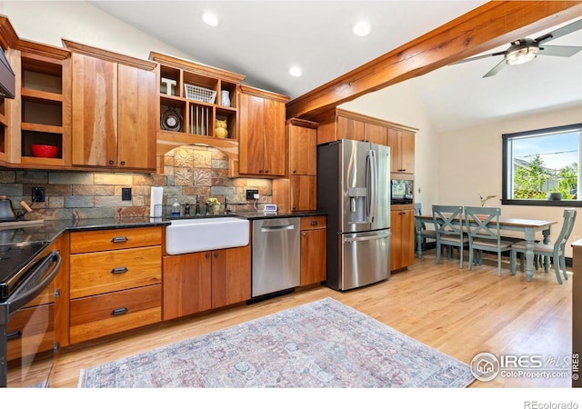 300 E Cleveland St, Lafayette, CO 80026 - kitchen with black appliances, open shelves, a sink, tasteful backsplash, and brown cabinets