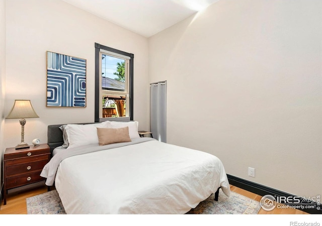 300 E Cleveland St, Lafayette, CO 80026 - bedroom with light wood-style floors