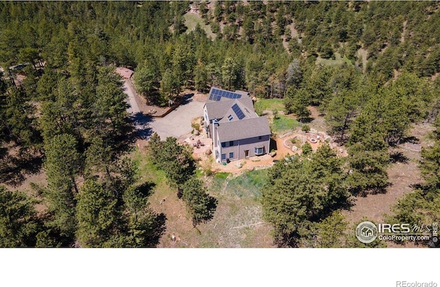 1057 Reed Ranch Rd, Boulder, CO 80302 - aerial view of property and surrounding area featuring a forest