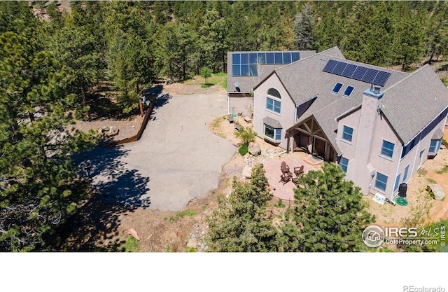 1057 Reed Ranch Rd, Boulder, CO 80302 - view from above of property with a heavily wooded area
