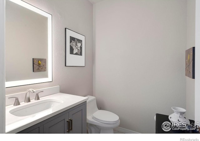 641 Yukon Ct, Windsor, CO 80550 - bathroom featuring vanity and toilet