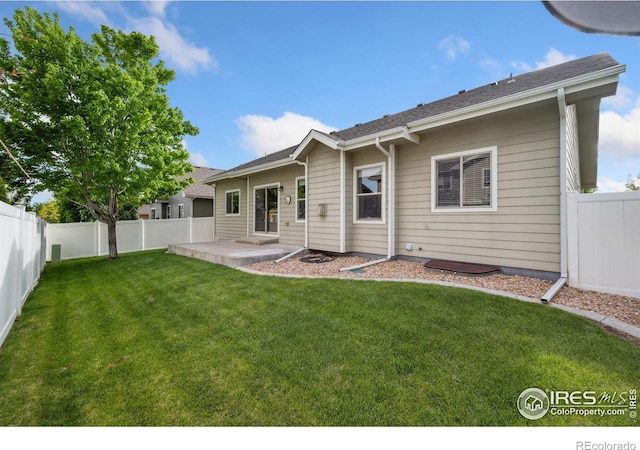 back of property with a patio area