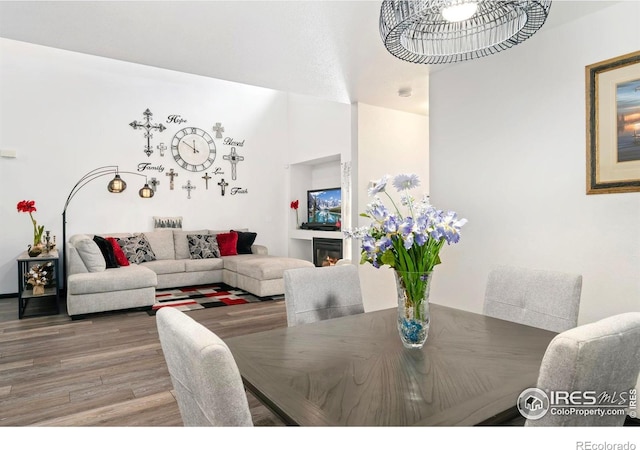 dining space featuring wood finished floors