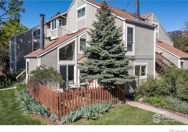 3193 Redstone Ln Unit B6, Boulder, CO 80305 - rear view of property featuring fence