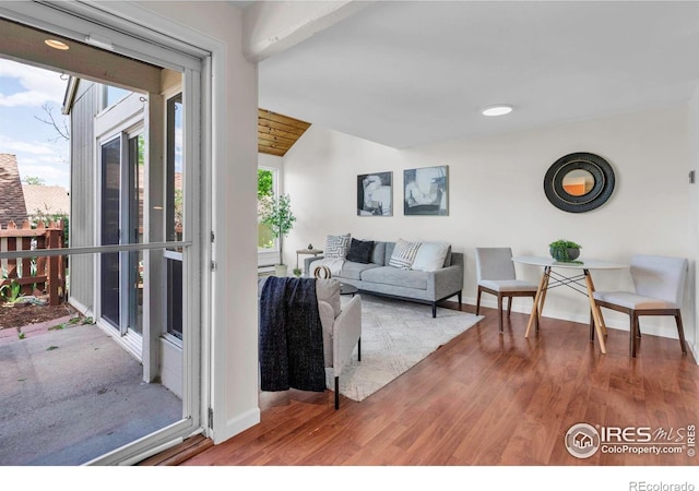 3193 Redstone Ln Unit B6, Boulder, CO 80305 - living area featuring wood finished floors and lofted ceiling