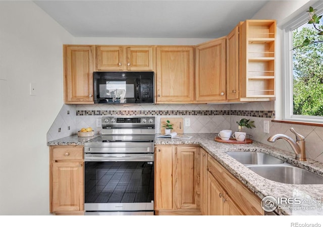 3193 Redstone Ln Unit B6, Boulder, CO 80305 - kitchen featuring black microwave, stainless steel range with electric stovetop, a sink, light brown cabinetry, and backsplash