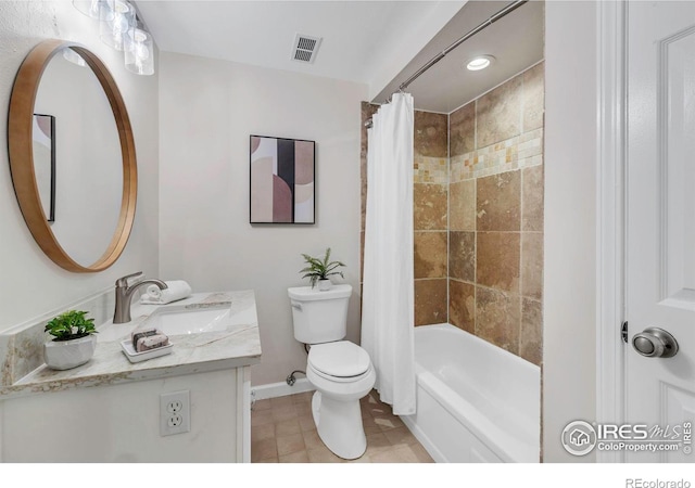 3193 Redstone Ln Unit B6, Boulder, CO 80305 - full bath featuring tile patterned floors, baseboards, toilet, vanity, and shower / bath combo
