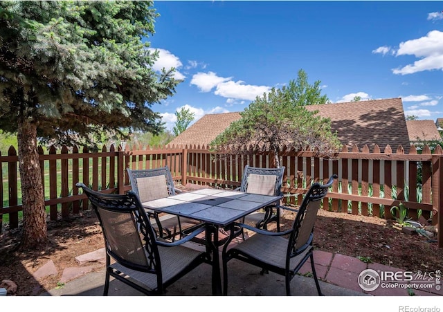 3193 Redstone Ln Unit B6, Boulder, CO 80305 - view of patio with outdoor dining area and fence
