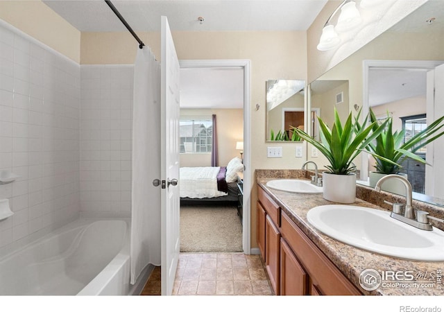 14300 Waterside Ln Unit V1, Broomfield, CO 80023 - full bath with shower / tub combo with curtain, ensuite bathroom, and double vanity
