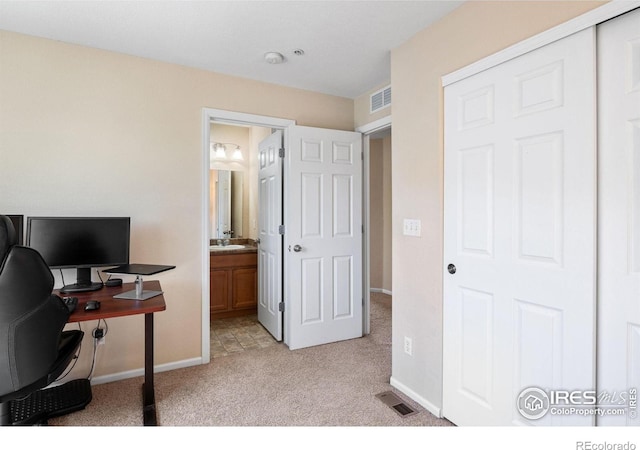 14300 Waterside Ln Unit V1, Broomfield, CO 80023 - office space with light carpet, a sink, and baseboards