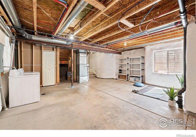 14300 Waterside Ln Unit V1, Broomfield, CO 80023 - unfinished below grade area featuring separate washer and dryer
