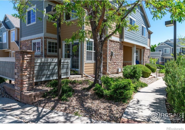 14300 Waterside Ln Unit V1, Broomfield, CO 80023 - view of side of property with a residential view