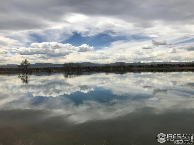 14300 Waterside Ln Unit V1, Broomfield, CO 80023 - water view featuring a mountainous background