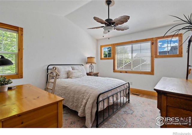 246 Rock Bridge Ln Unit 3, Windsor, CO 80550 - bedroom featuring lofted ceiling, wood finished floors, baseboards, and a ceiling fan