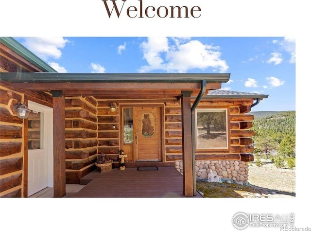 278 Clark Rd, Bailey, CO 80421 - doorway to property featuring log siding