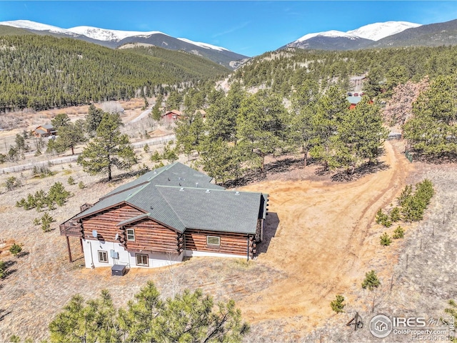 278 Clark Rd, Bailey, CO 80421 - view of subject property with mountains and a heavily wooded area