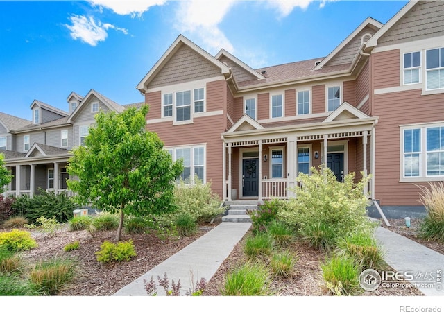 214 Tigercat Way, Fort Collins, CO 80524 - view of property featuring a porch