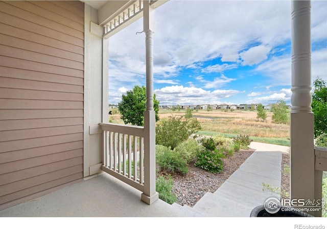 214 Tigercat Way, Fort Collins, CO 80524 - view of patio with a porch