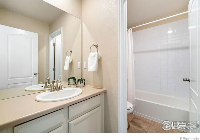 214 Tigercat Way, Fort Collins, CO 80524 - bathroom with tile patterned floors, toilet, vanity, and shower / bath combination with curtain