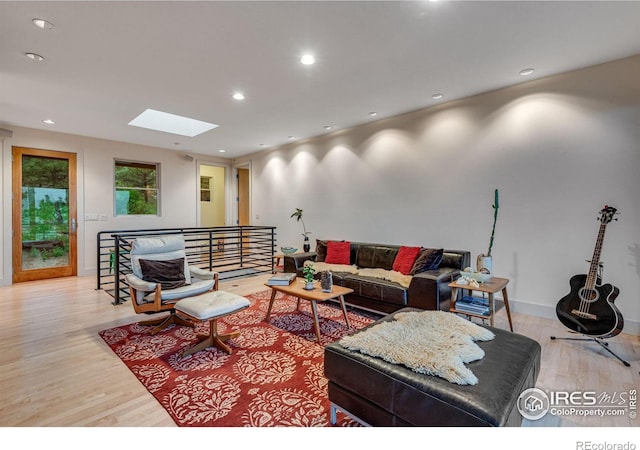 435 Quartz Way, Lyons, CO 80540 - living area with a skylight, light wood-style flooring, and recessed lighting