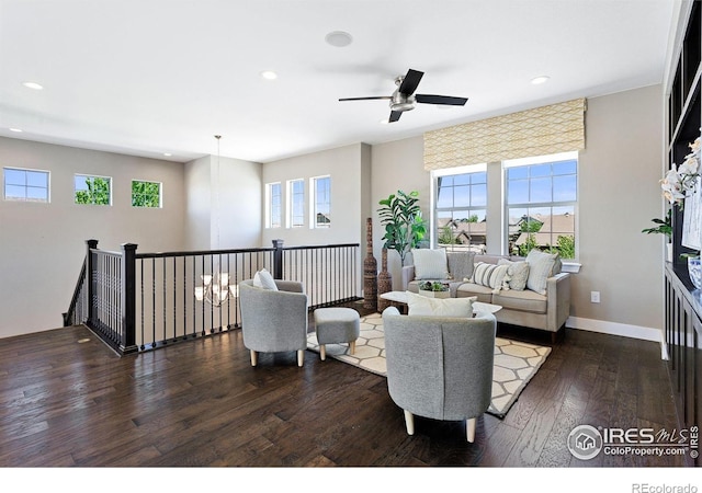 16069 Pikes Peak Dr, Broomfield, CO 80023 - living room with recessed lighting, dark wood-style flooring, healthy amount of natural light, ceiling fan, and baseboards