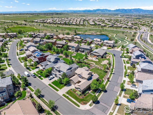 16069 Pikes Peak Dr, Broomfield, CO 80023 - aerial perspective of suburban area with a water and mountain view