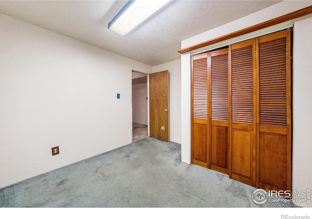 2167 Hackberry Cir, Longmont, CO 80501 - unfurnished bedroom with carpet and a closet