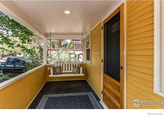 628 Endicott St, Fort Collins, CO 80524 - balcony featuring covered porch
