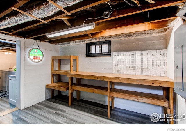 628 Endicott St, Fort Collins, CO 80524 - unfinished below grade area with wood finished floors and independent washer and dryer
