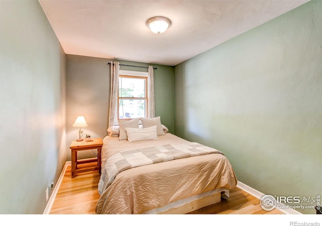 628 Endicott St, Fort Collins, CO 80524 - bedroom with baseboards and light wood-style flooring