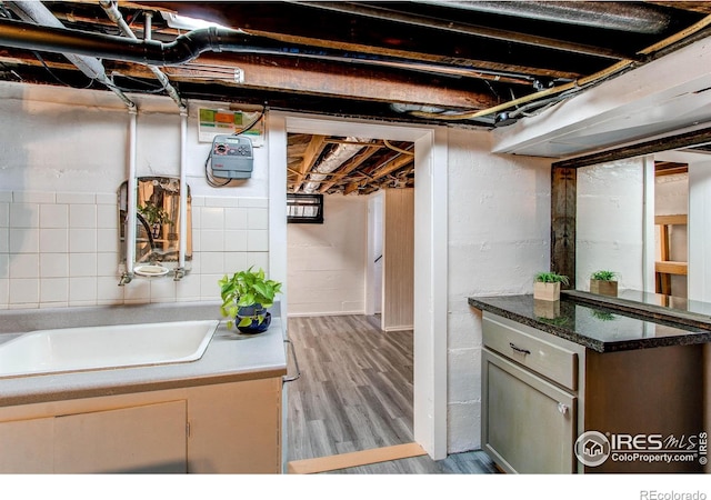 628 Endicott St, Fort Collins, CO 80524 - unfinished basement with wood finished floors