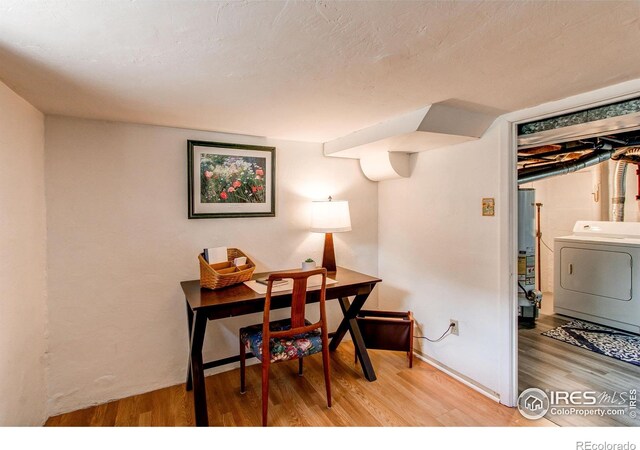 628 Endicott St, Fort Collins, CO 80524 - office with washer / dryer, gas water heater, and wood finished floors