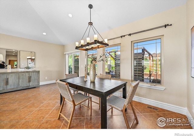 tiled dining room with vaulted ceiling, baseboards, a chandelier, and recessed lighting