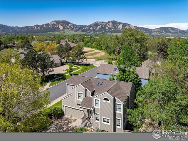 5523 Stonewall Pl, Boulder, CO 80303 - aerial view of property and surrounding area featuring a mountainous background
