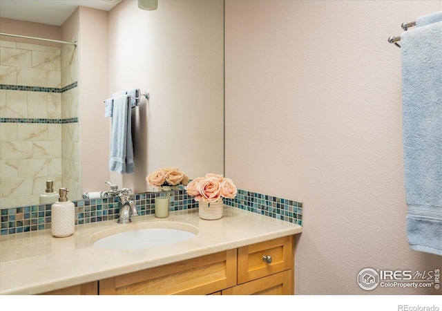 5523 Stonewall Pl, Boulder, CO 80303 - bathroom with tasteful backsplash and vanity