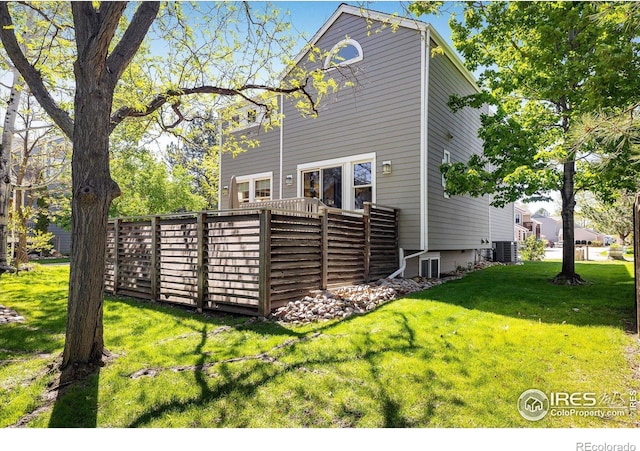 5523 Stonewall Pl, Boulder, CO 80303 - rear view of house featuring a lawn and cooling unit