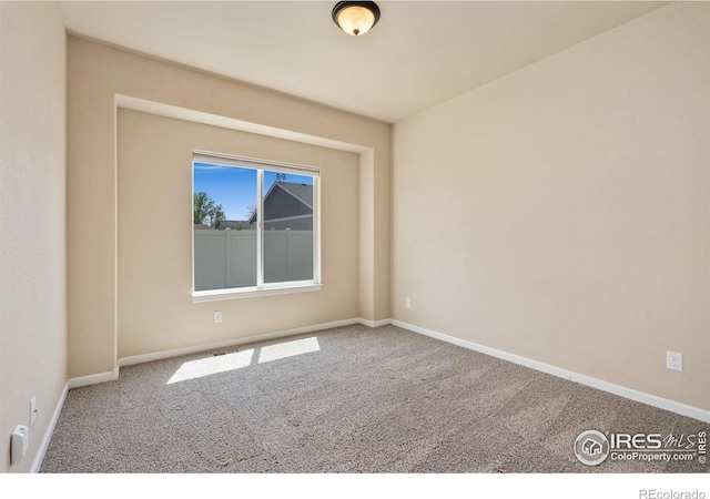 3933 Mount Hope St, Wellington, CO 80549 - unfurnished room with carpet and baseboards