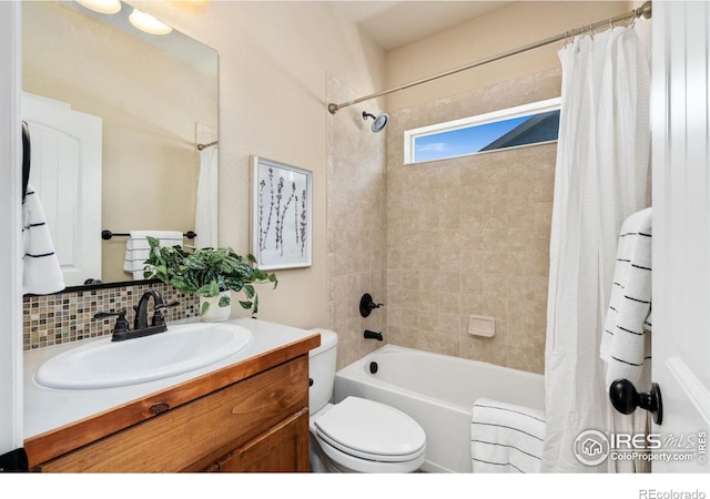 3933 Mount Hope St, Wellington, CO 80549 - bathroom featuring decorative backsplash, vanity, shower / bath combo, and toilet
