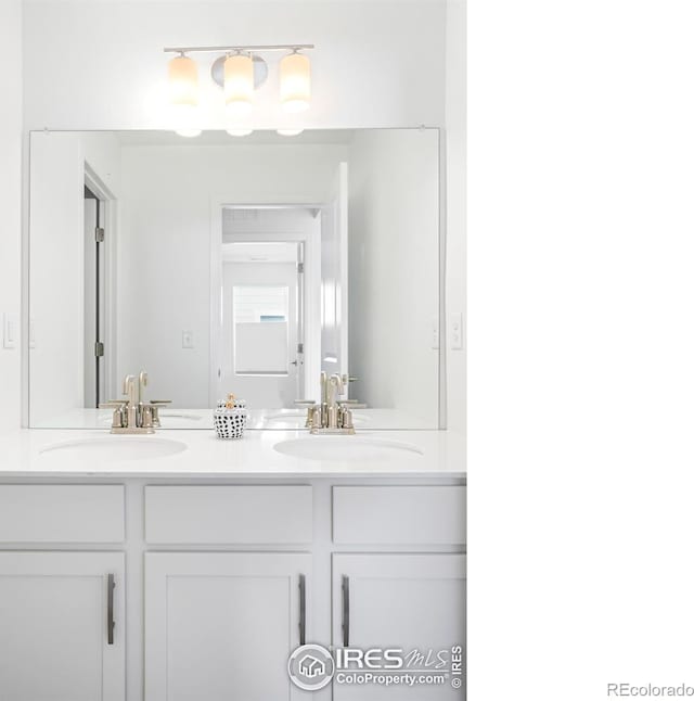 full bathroom with double vanity