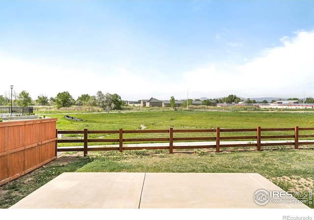 view of patio with a rural view