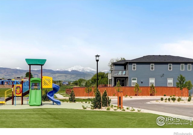 community play area with a mountain view
