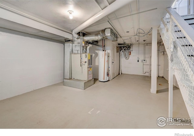 1235 Leyden St, Denver, CO 80220 - unfinished basement featuring water heater and heating unit