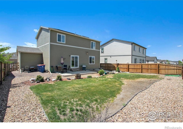 back of house featuring a patio area
