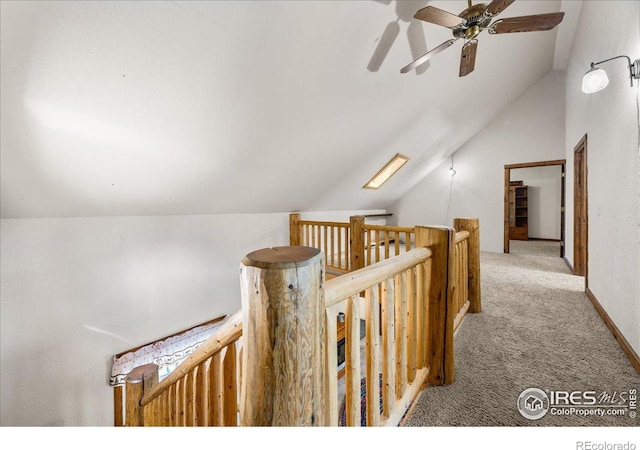 457 Spruce Mountain Dr, Drake, CO 80515 - hallway featuring carpet floors, an upstairs landing, and lofted ceiling