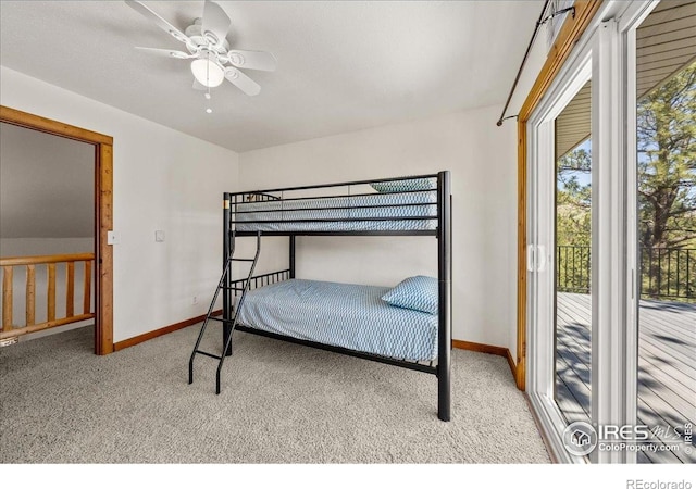 457 Spruce Mountain Dr, Drake, CO 80515 - carpeted bedroom featuring baseboards, access to outside, and a ceiling fan